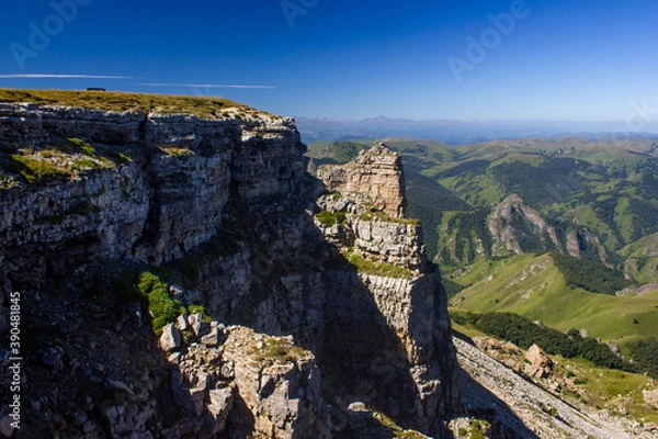 Fototapeta A beautiful gorge in the Caucasus Mountains. Blue sky and huge rocks. Bermamyt plateau
