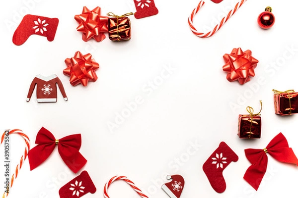 Fototapeta Christmas wreath. Stocking, gifts, winter tree, ribbon and bow in shape frame on white background for greeting card. Xmas backdrop with space for text.