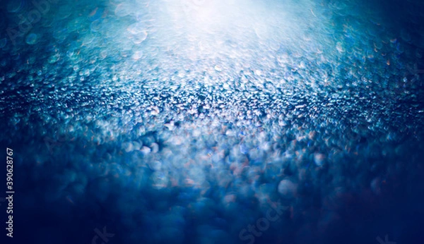 Fototapeta Blue bokeh. Abstract blue colorful background and texture with circles of light for art and design