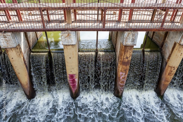 Fototapeta On the river dam discharge of water, the river Sysert
