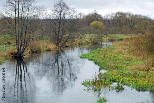 Obraz Autumn landscape Early November Beautiful view of meadows and river floodplain Water and sky Reflection