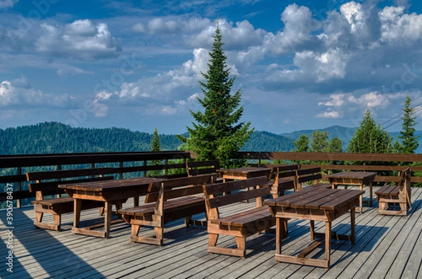 Obraz A summer cafe overlooking the mountains