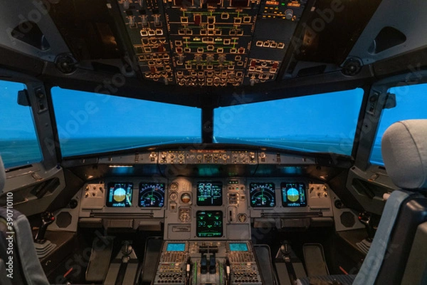 Fototapeta modern airplane cockpit  in a full flight simulator - a state of the art training device 