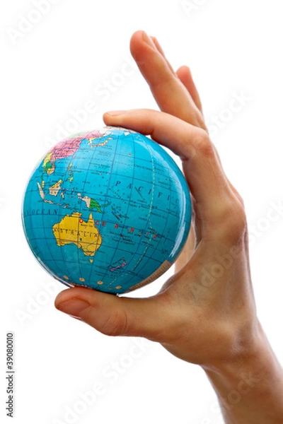 Obraz Hand taking a globe