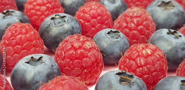 Fototapeta background is   made of raspberry and biueberry