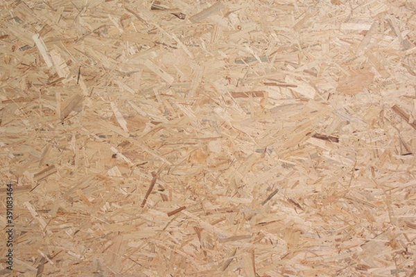 Obraz Plank made from wood chips and sawdust for industrial use or as a raw material for furniture.