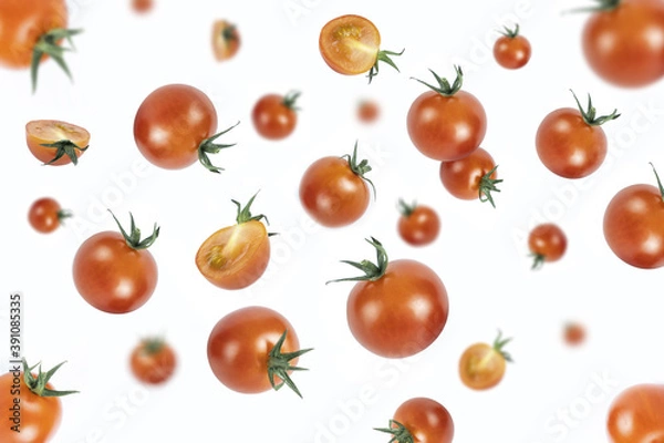 Obraz Red tomatoes levitate on a white background.Vegetables fall.