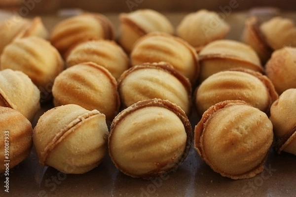 Fototapeta Delicious cookies nuts with condensed milk macro