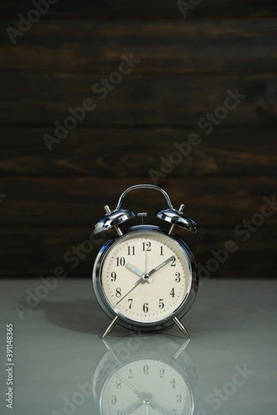 Fototapeta Retro alarm clock on table