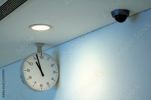 Fototapeta Clock and security camera