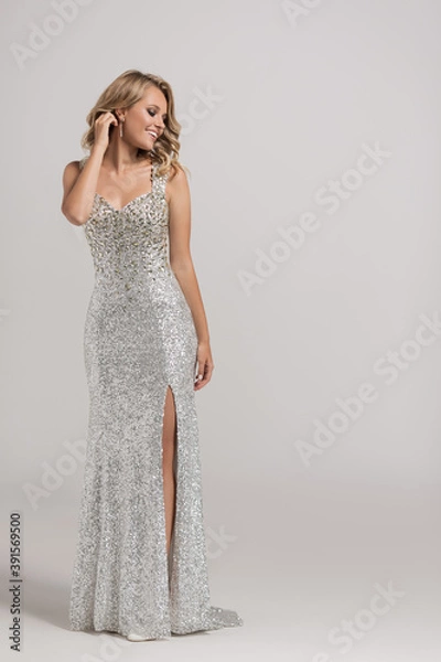 Obraz Attractive girl in a shiny evening dress made of diamonds.