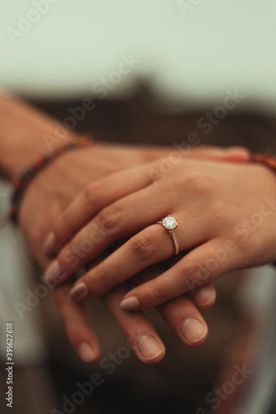Obraz bride and groom holding hands