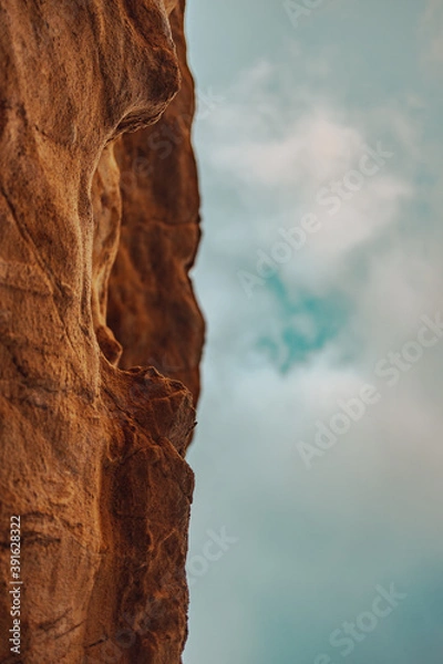 Obraz cloudy blue sky with rock