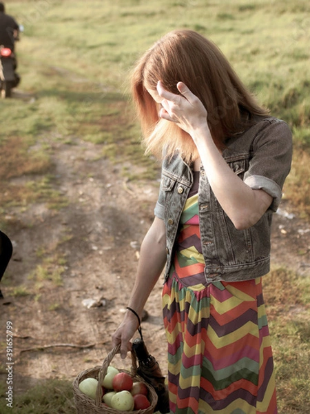 Fototapeta child playing with a rabbit