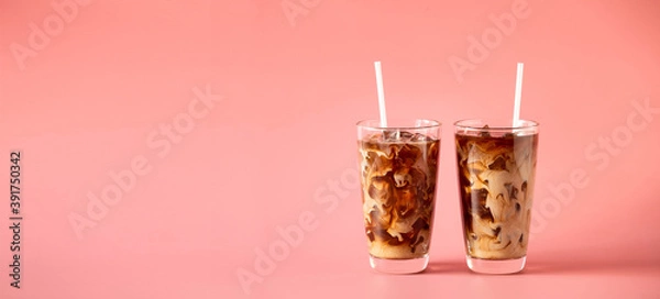 Fototapeta Glasses of coffee milk on pink background. Cold beverage tasty. Refreshment food. Web banner