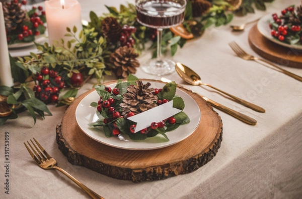 Obraz Christmas table setting with decorations and candles. 