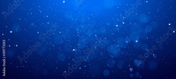 Fototapeta Banner Blue bokeh particles glitter awards dust gradient abstract background. Futuristic glittering in space on blue background.