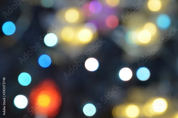 Fototapeta Red yellow blue and orange holiday bokeh. Abstract Christmas background new year background, no focus, blur, blurry