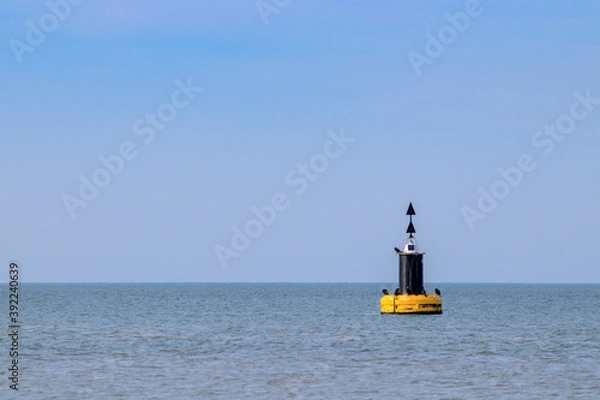 Fototapeta Bouée de signalisation à l'entrée du port