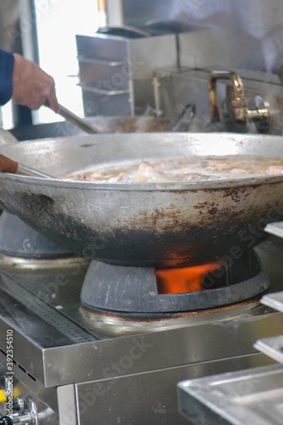 Obraz blacksmith working on a stove