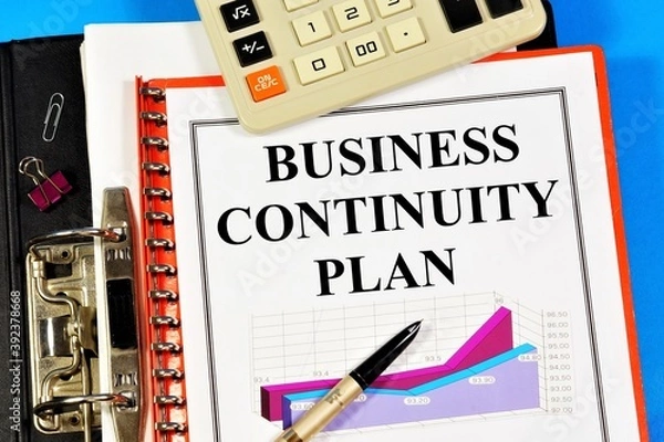 Fototapeta Business continuity plan. The text label in the folder office of the Registrar and chart the effectiveness of business planning. Strategy for achieving goals in the future.