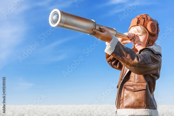 Obraz Young aviator with a telescope