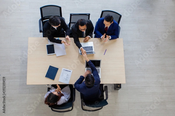 Obraz Business people shaking hands, finishing up meeting. Handshake Gesturing People Connection Deal Concept