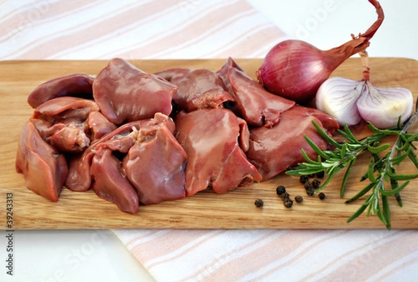 Obraz Raw liver on wooden board