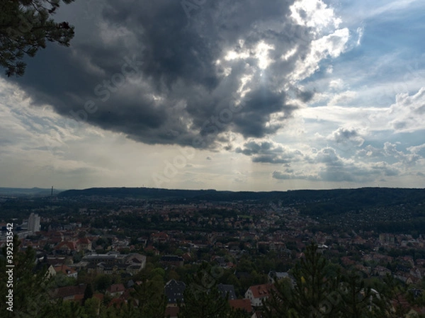 Fototapeta Cloudy sky view on jena at summer
