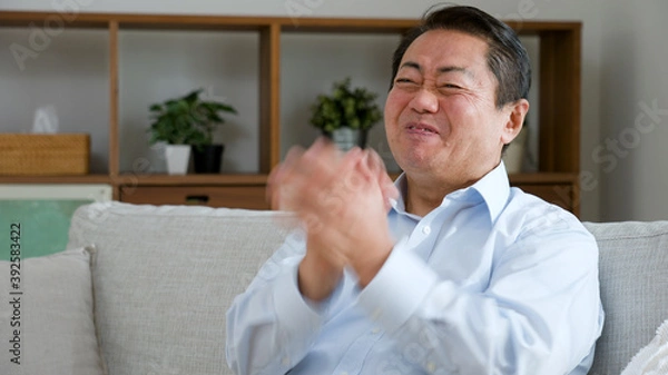 Fototapeta 大笑いする中年男性