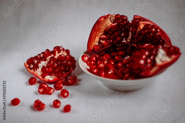 Fototapeta pomegranate on a plate