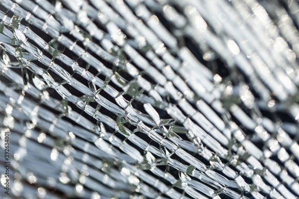 Fototapeta Broken glass surface. abstract background and texture as pattern.