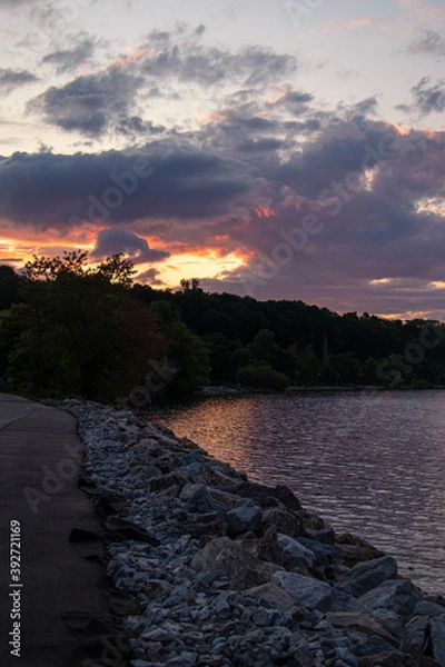 Obraz Gorgeous cloudy sunset over the lake