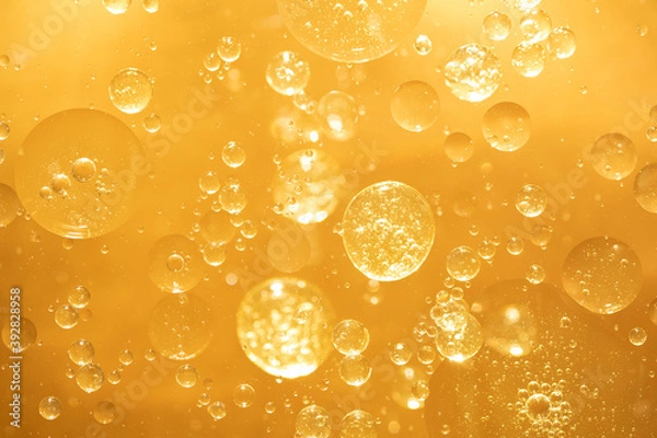 Obraz golden yellow bubble oil droplet, abstract background
