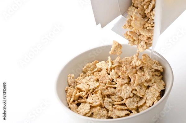 Obraz Cereal pouring into a bowl