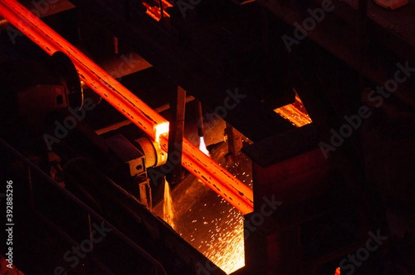 Fototapeta production of hot rolled products in a metallurgical shop. finished products go along the conveyor