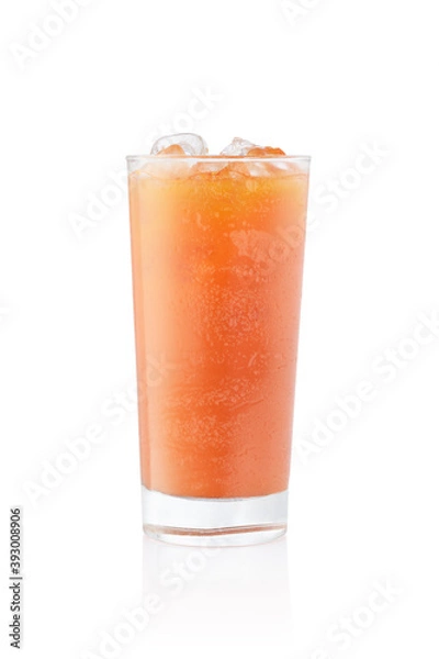 Obraz Orange juice with ice in a frozen glass on white background
