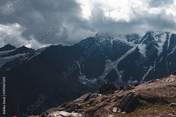 Fototapeta seven glacier under the clouds, view from mount Cheget