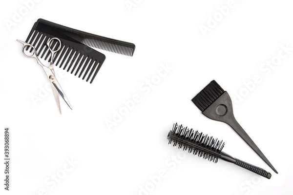 Fototapeta Hairdressing tools on a white background