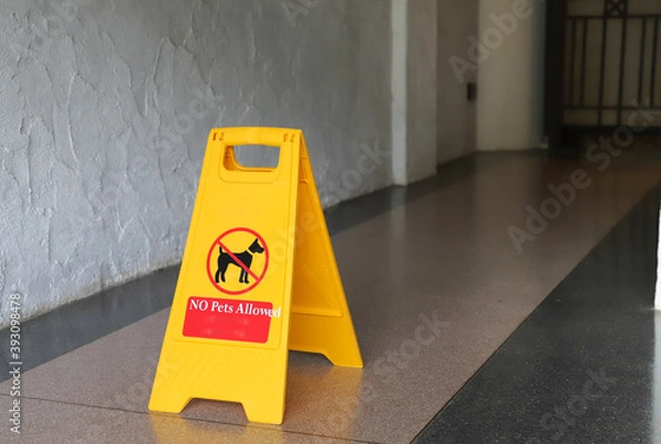 Fototapeta Closeup of no pet allowed sign on the floor.