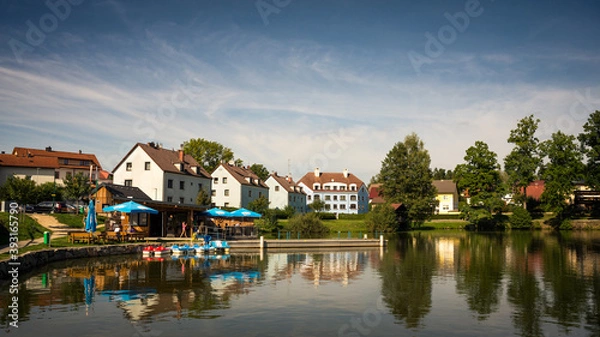 Fototapeta View of Litschau in lower Austria with lake and reflections