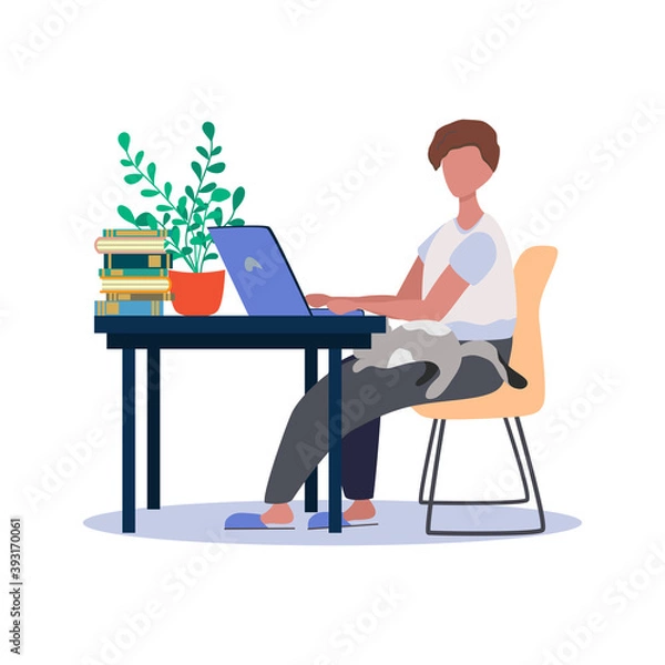 Fototapeta A man works at a laptop at home at a table. Freelance concept, quarantine due to covid-19