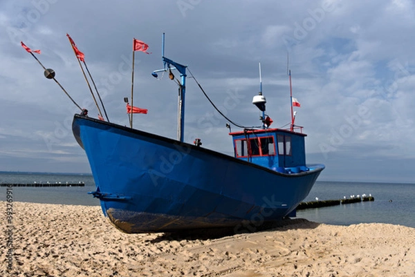 Obraz A fishing boat on the shores of the Baltic Sea