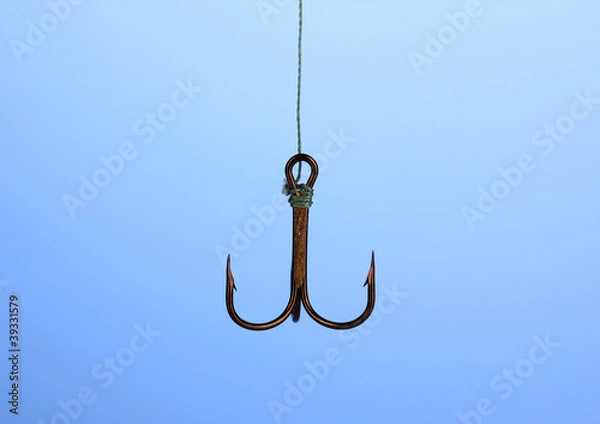 Obraz Treble fish hook on blue background