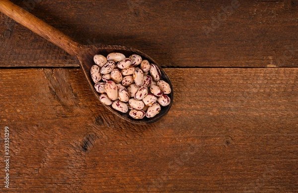 Obraz Colored beans on wooden background.