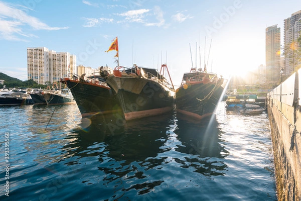 Fototapeta Aberdeen Harbour seen from Ap Lei Chau Bridge, In this area you will find fishing boats, houseboats, and sampans, The bay between the south coast of Hong Kong Island