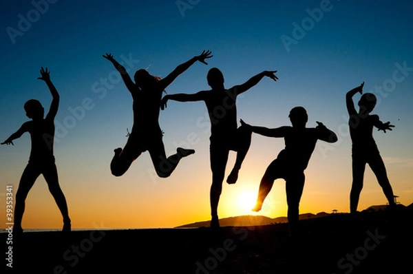 Obraz happy kids silhouettes jumping on the beach