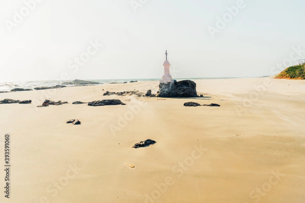 Fototapeta Cross tribute to sailors lost at sea. Morjim Beach, Goa