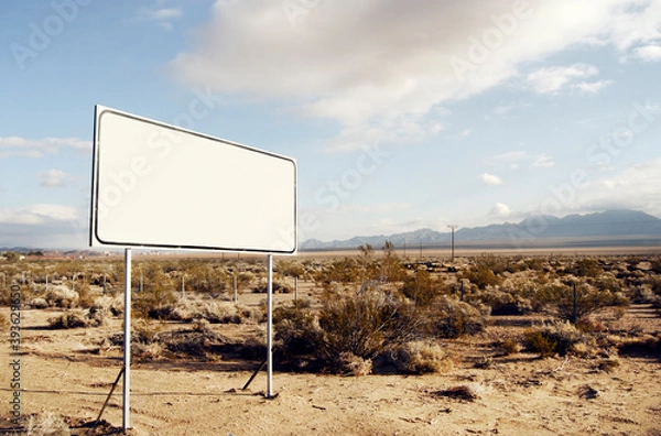 Fototapeta Empty sign board on a desert highway
