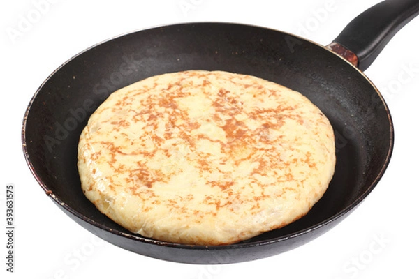 Obraz Spanish omelette in frying pan. Isolated with clipping path.